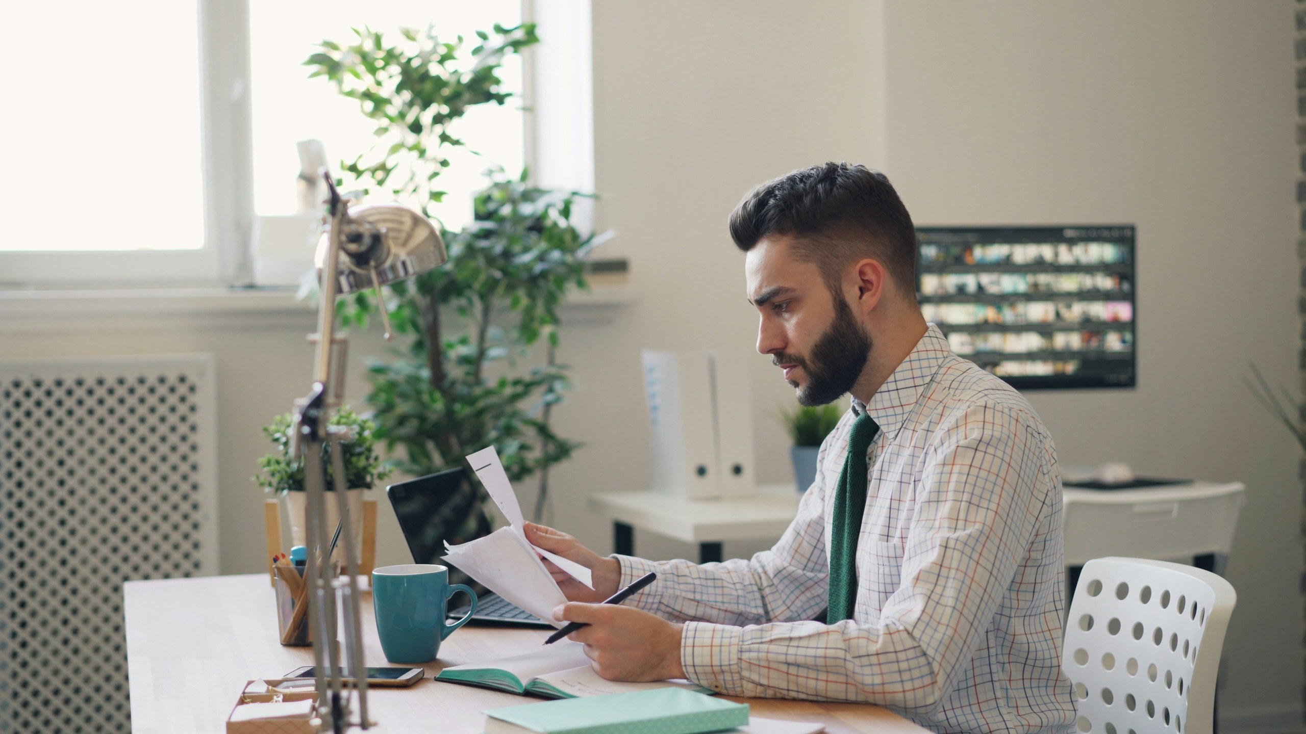 Client reviewing legal documents during a stressful moment